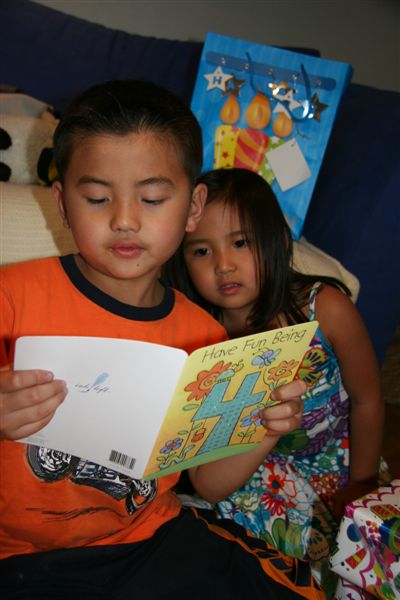 Cameron reading carefully and s-l-o-w-l-y