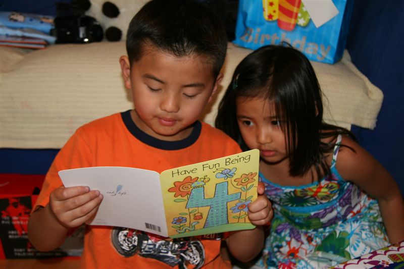 Kendra, impatiently waitng for Cameron to reveal who this present is from...