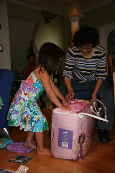 Grandma gives Kendra girly bedding