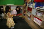 Kendra picking a free gift from Jungle Jacs