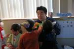 The kids feed Uncle Shyang