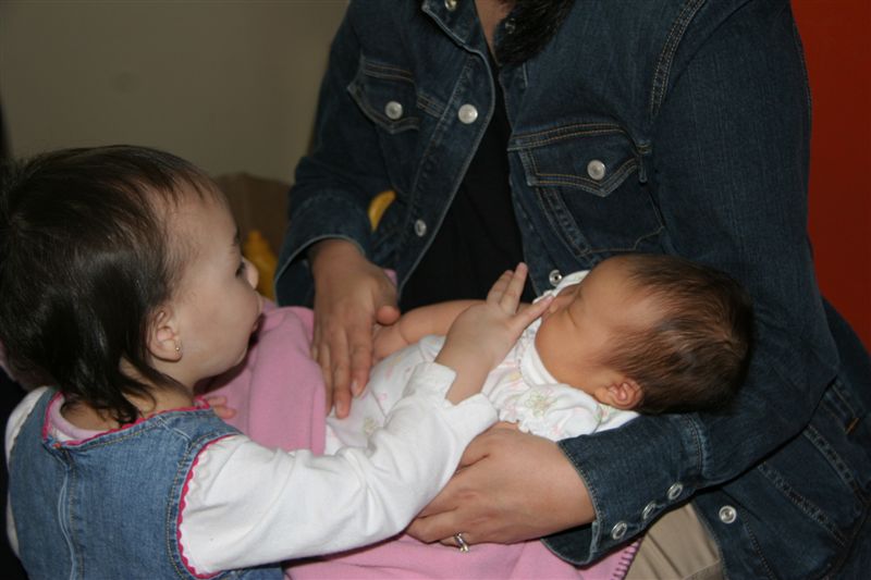 Tia practises being a big sister