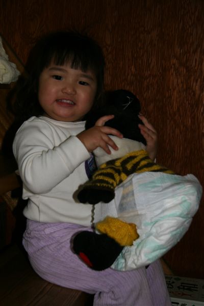 Kiki put the diaper on this doll