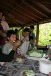 MJ opens wide for yummy cake!
