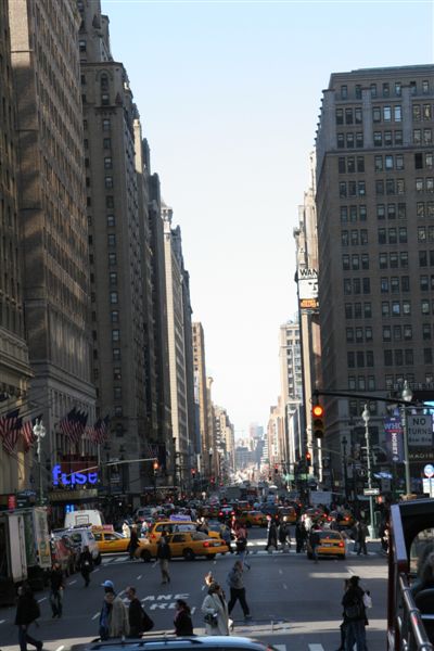Taxis and pedestrians happily co-exist