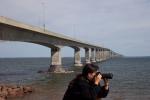 Oh my god.  She is taking a picture of ANOTHER lighthouse??
