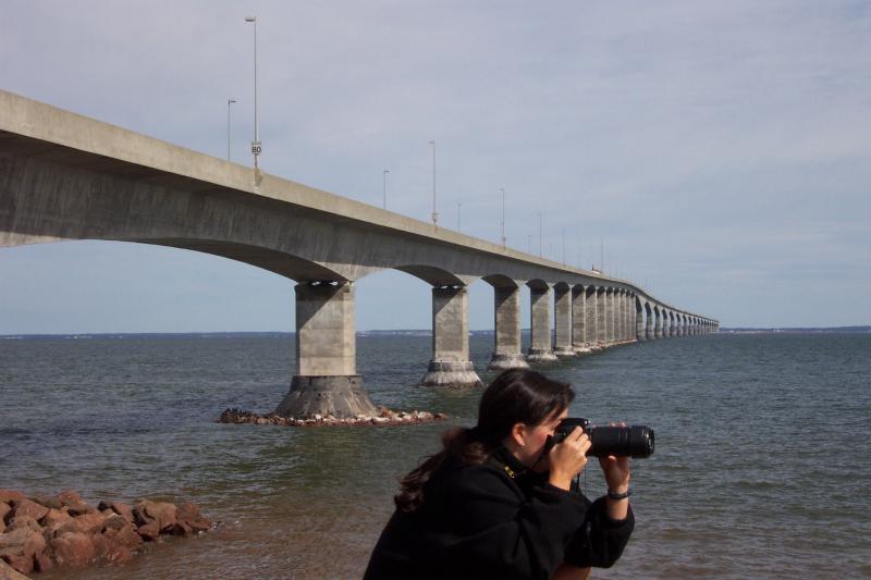 Oh my god.  She is taking a picture of ANOTHER lighthouse??