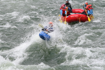 Kayaker takes a big wave