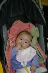 Tia munching on her fist