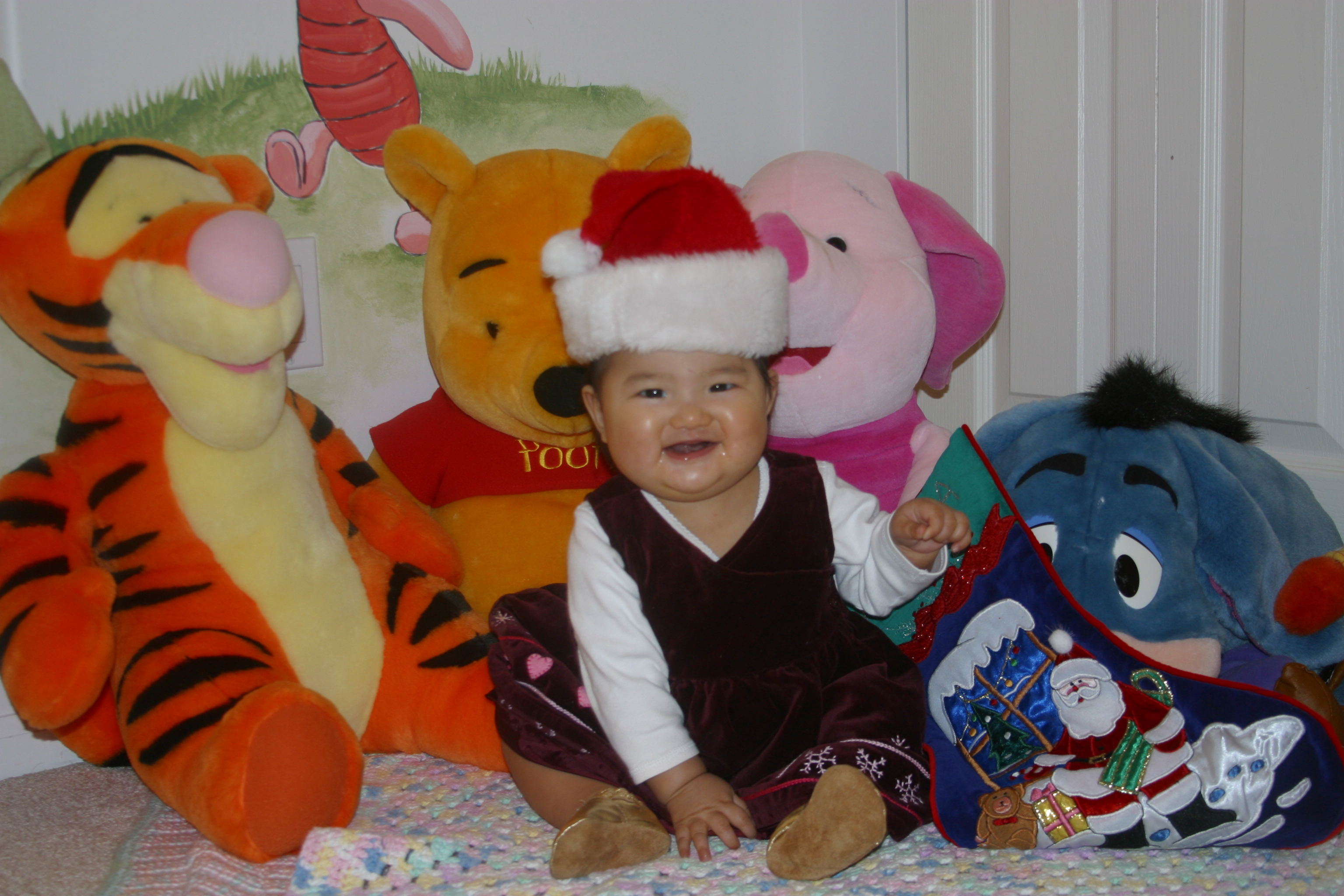 Kendra at 7 months - in her ho-ho hat!